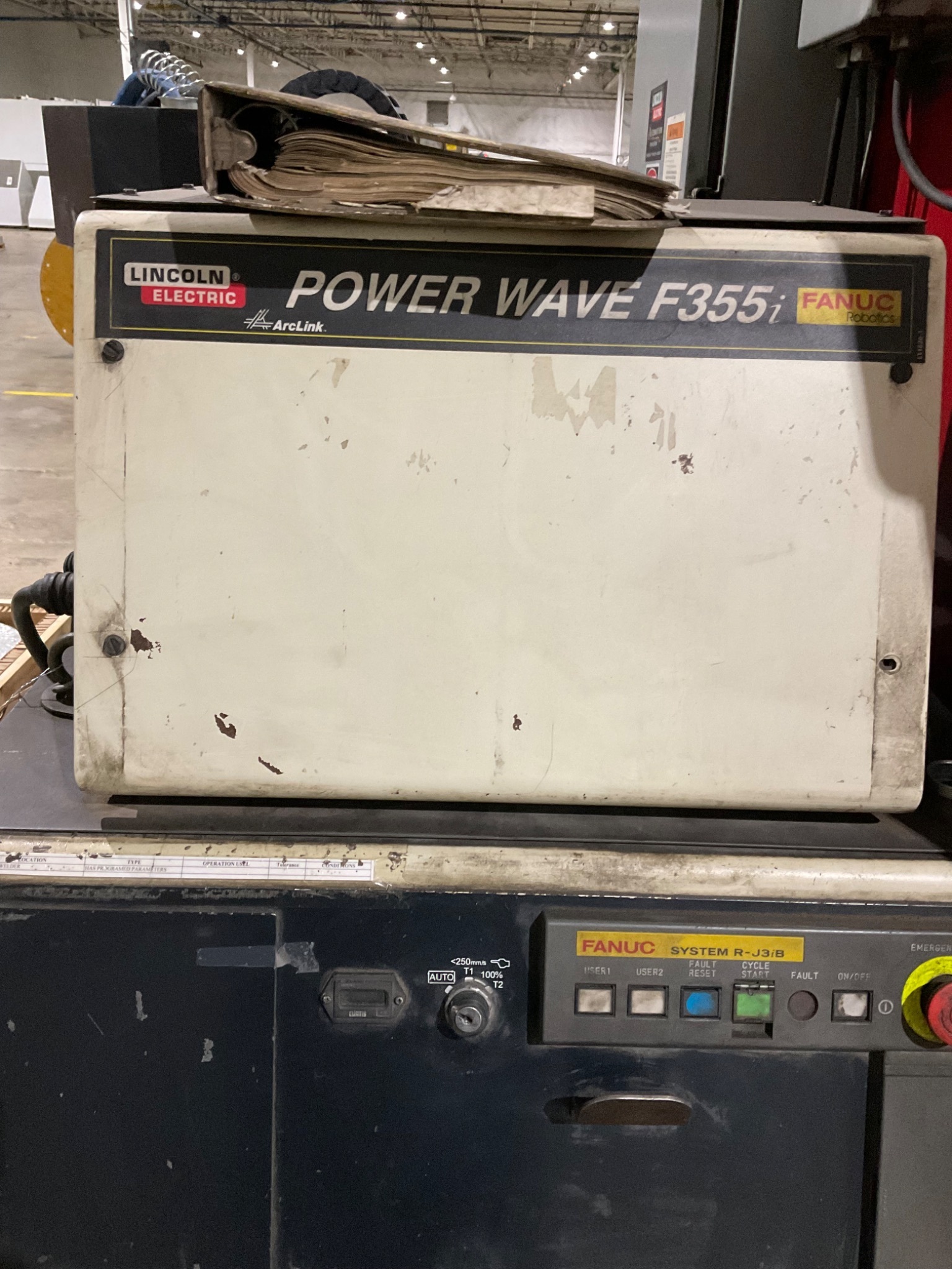 LINCOLN ELECTRIC SYSTEM 10 MIG CELL FANUC ROBOT 16