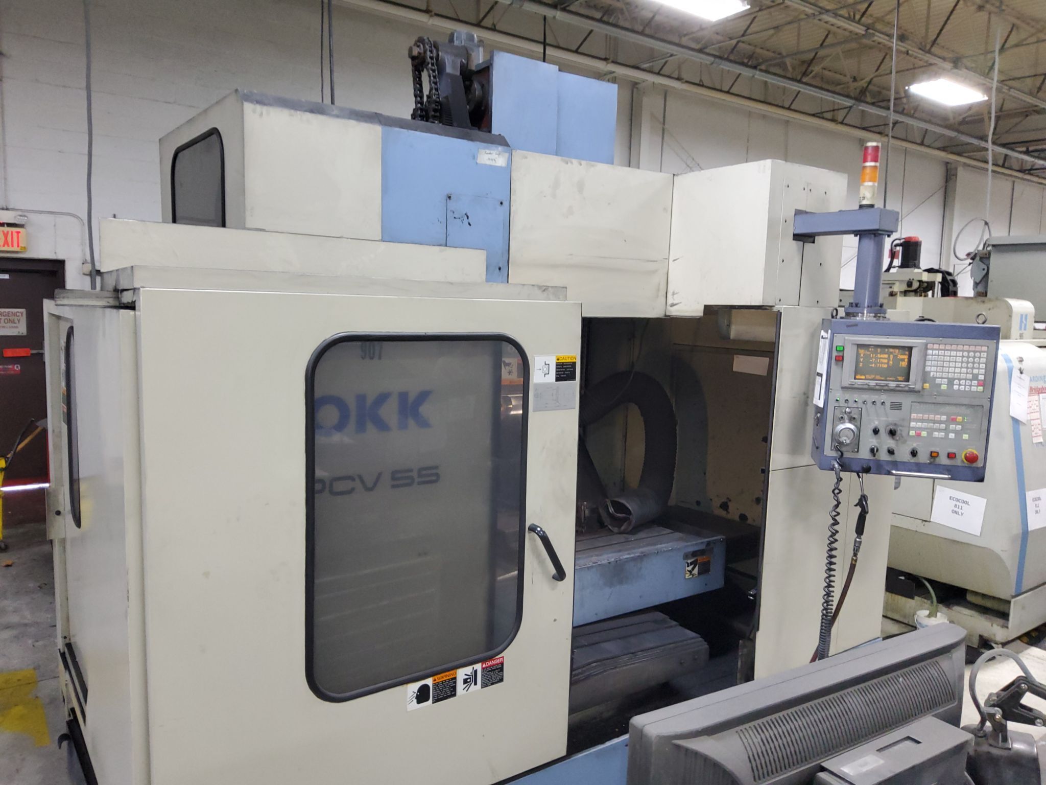 OKK PCV-55 CNC VERTICAL MACHINING CENTER USED 1