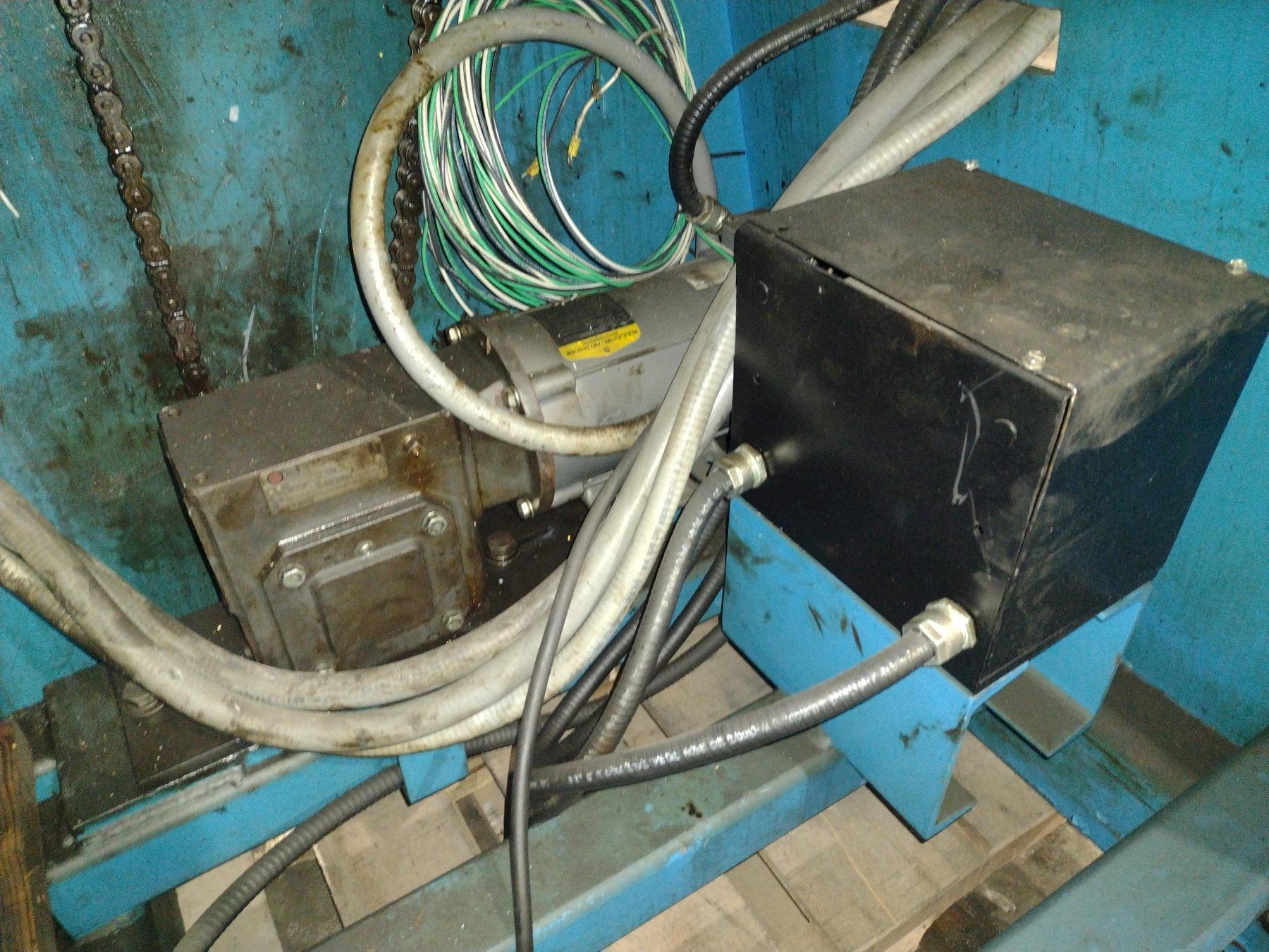 6,000 X 12" COLT MODEL #CR-60-12 MOTORIZED COIL REEL UNCOILER USED 18