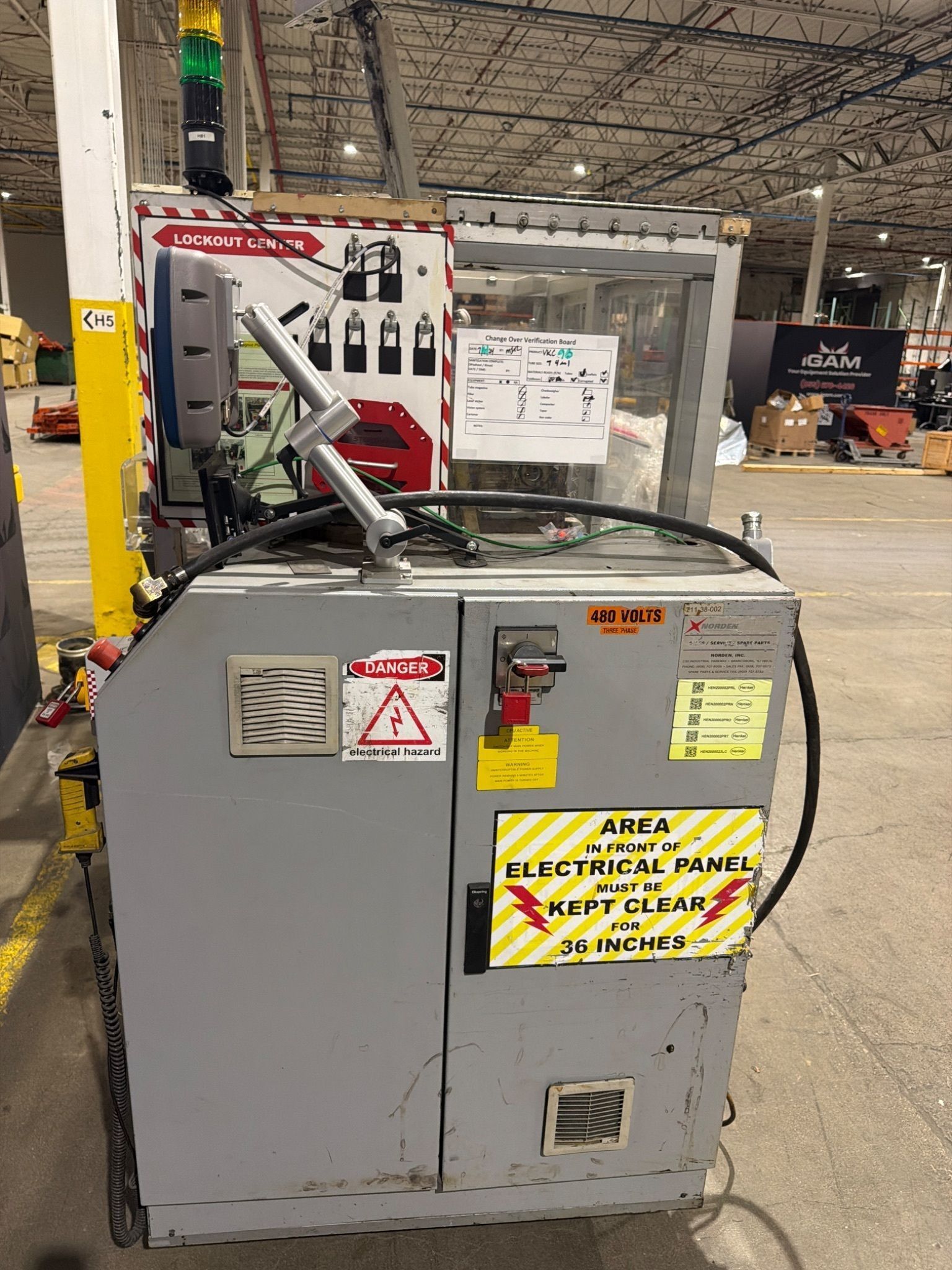 NORDEN NM 702 Tube Filling Machine w/ Domino Laser Marking System USED 2