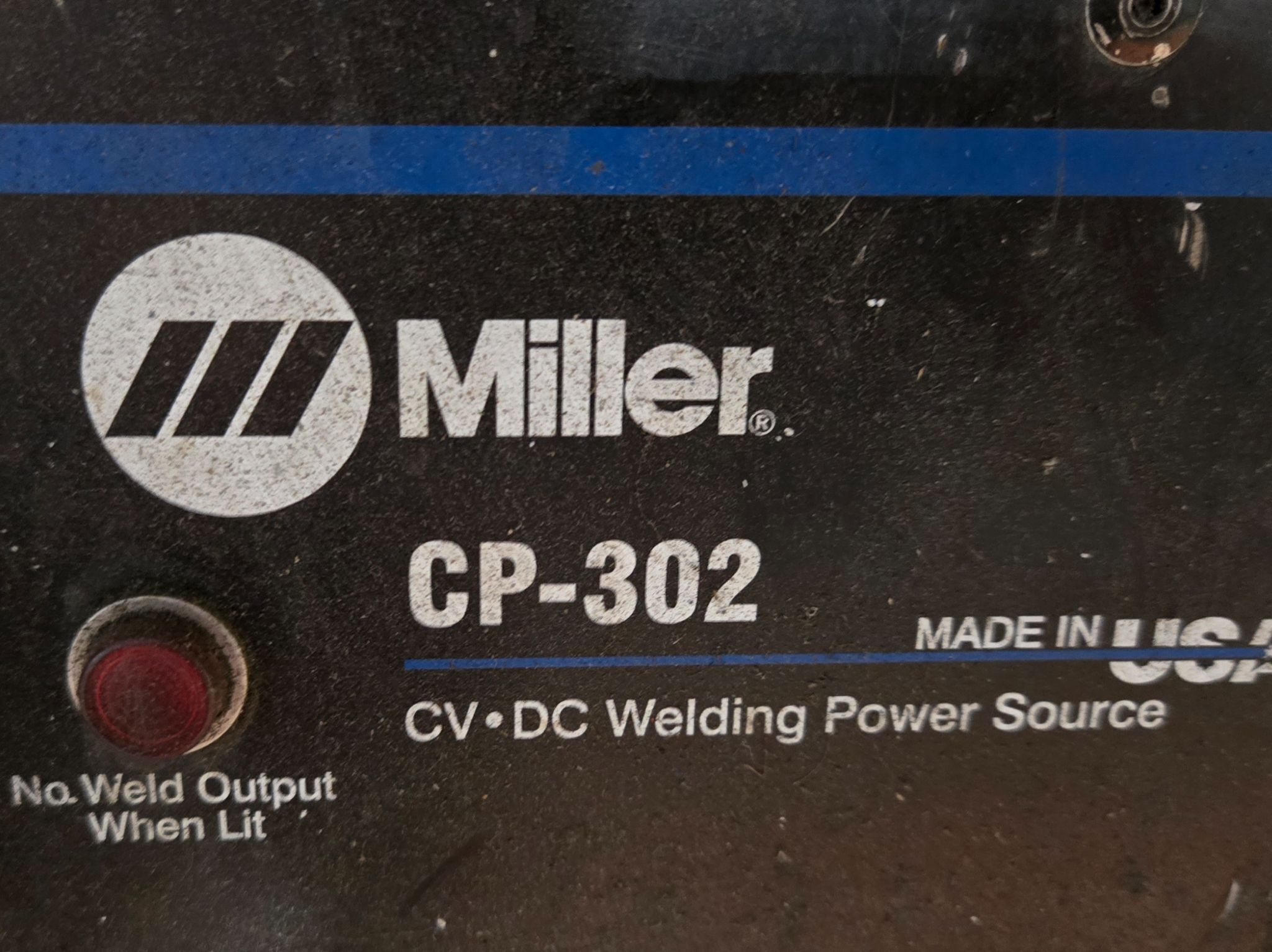 MILLER CP-302 MIG WELDER WITH 60 SERIES 24V WIRE FEEDER USED 5