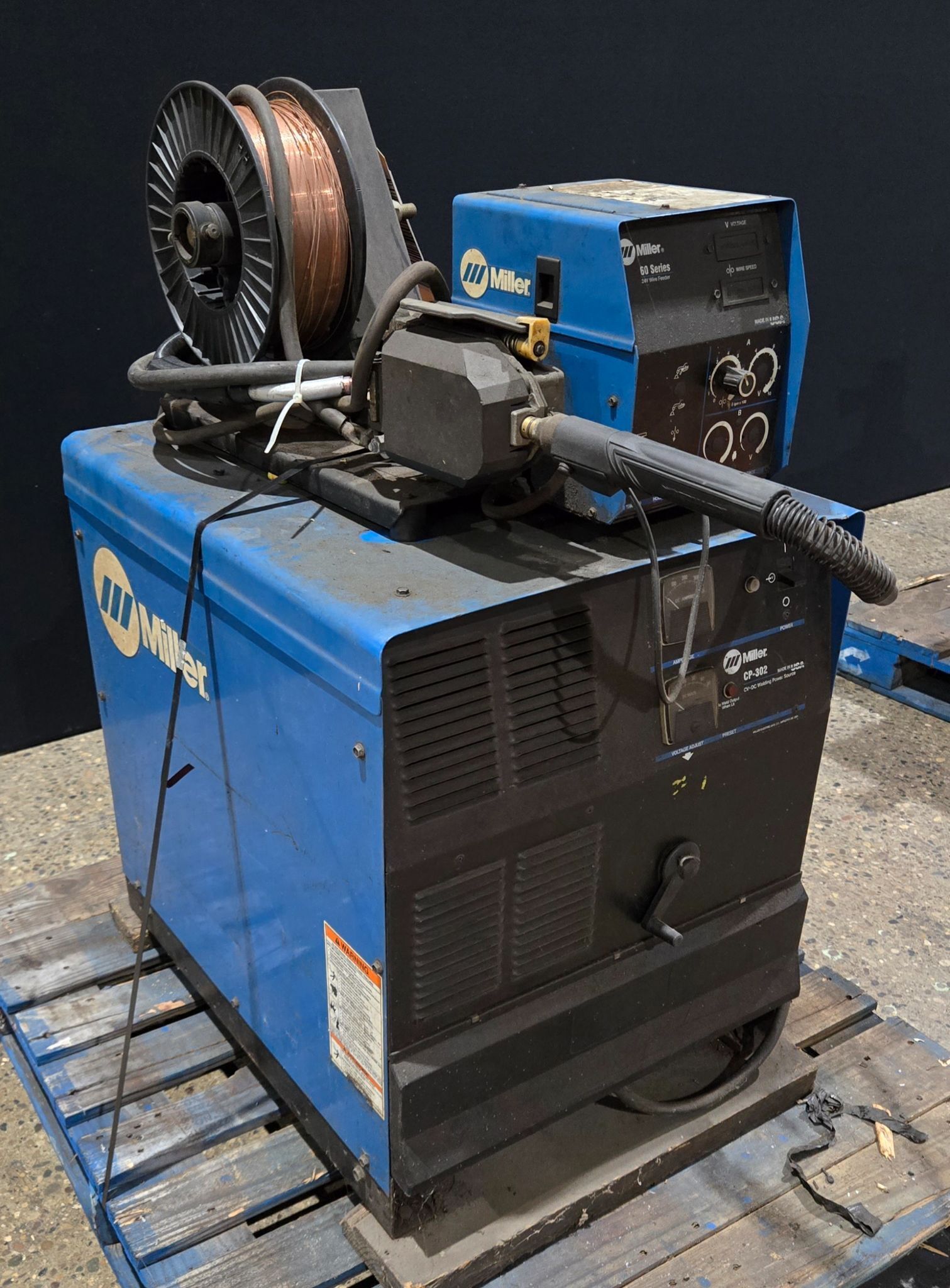 MILLER CP-302 MIG WELDER WITH 60 SERIES 24V WIRE FEEDER USED 1