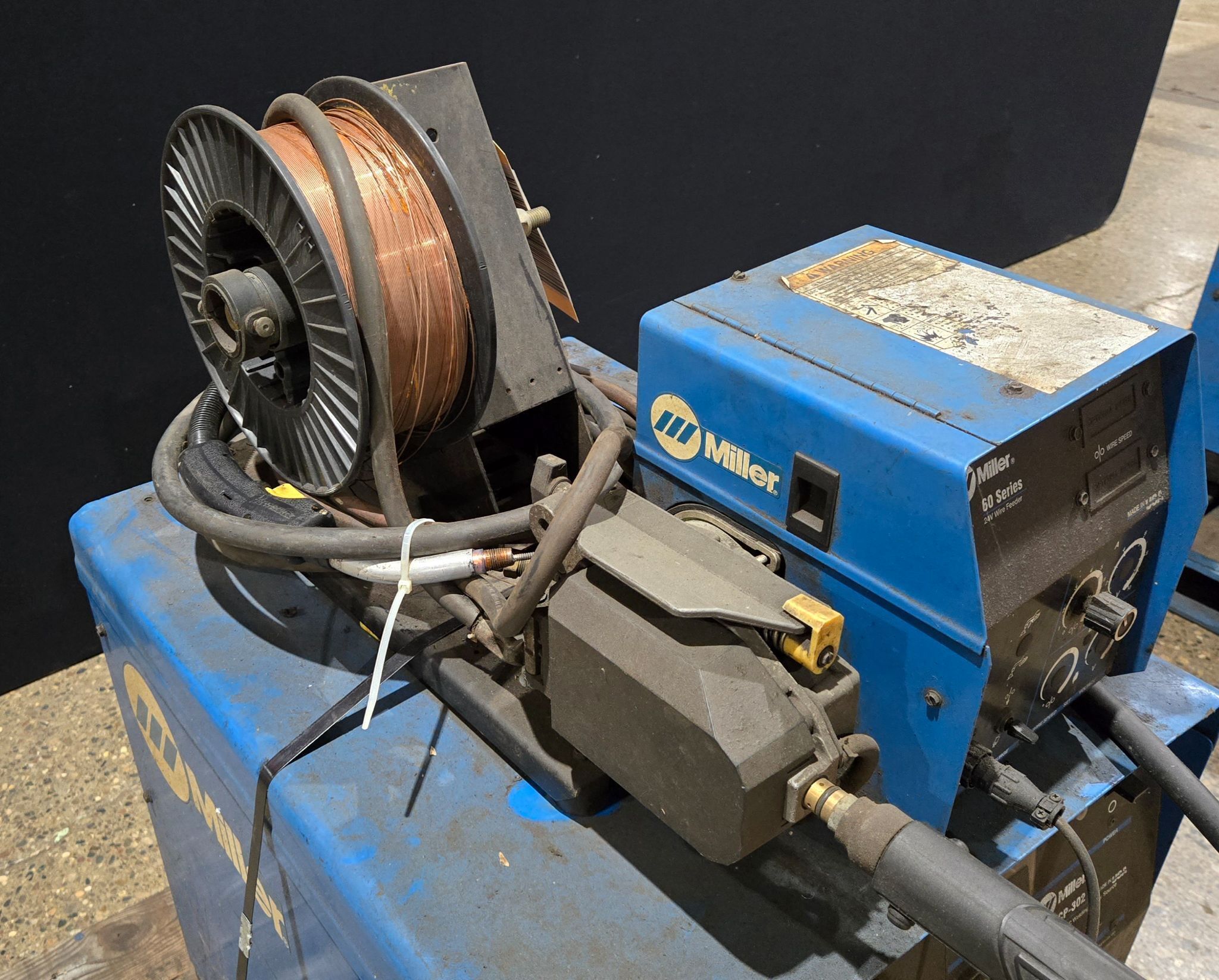 MILLER CP-302 MIG WELDER WITH 60 SERIES 24V WIRE FEEDER USED 7