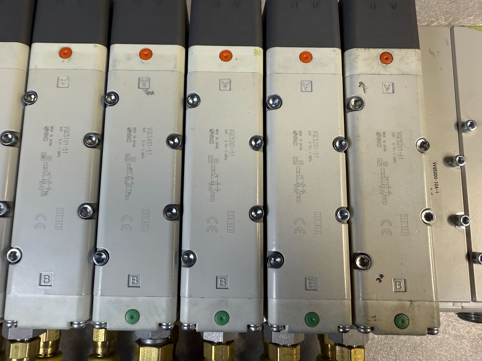 SMC VV5QC51-1204TSKAN VQC Manifold w/ (2) VQ5101-51, (4) VQ5201-51, (3) VQ4201-51 Solenoid Valves USED 2